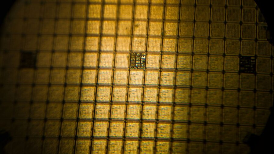 A close up of a yellow light in a dark room
