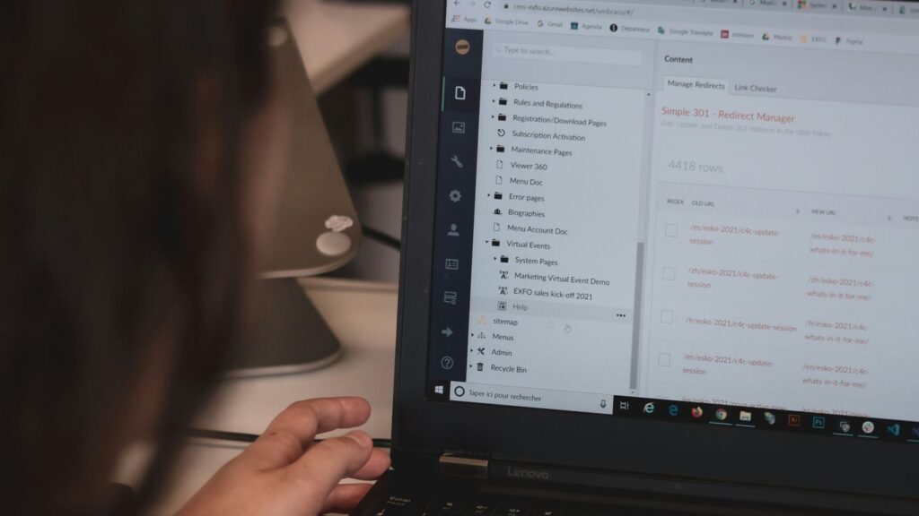person using black laptop computer
