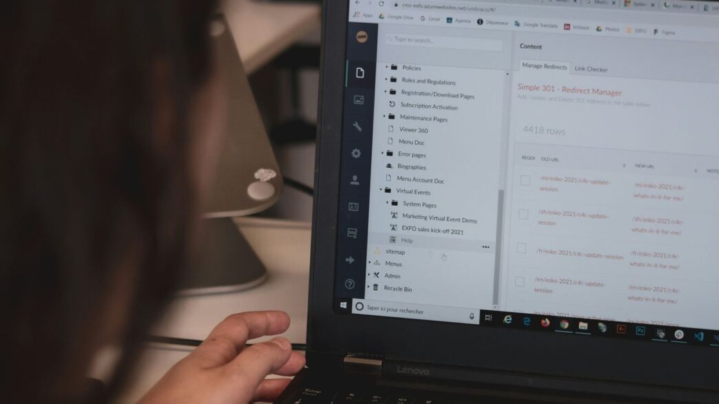 person using black laptop computer