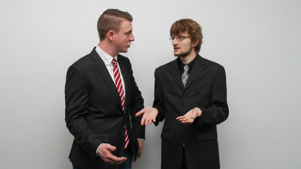 man wearing black suit jacket