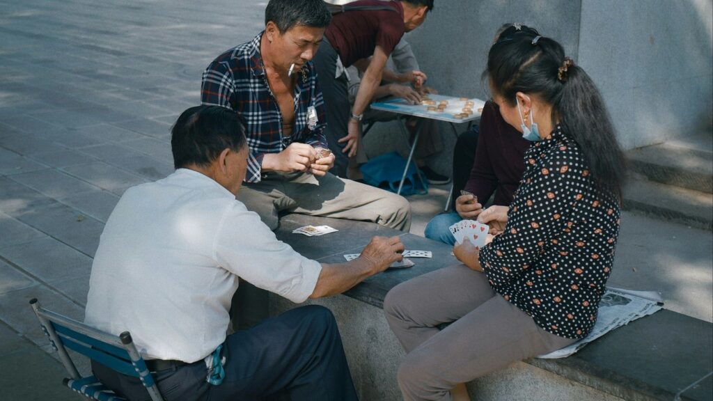 a group of people sitting around a table