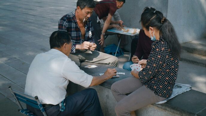 a group of people sitting around a table