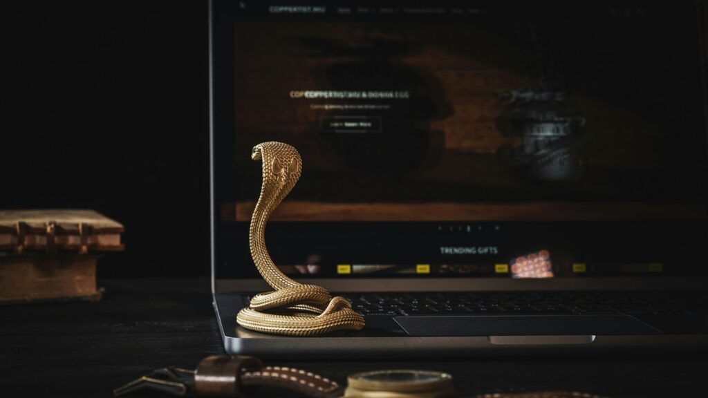 a laptop computer sitting on top of a desk