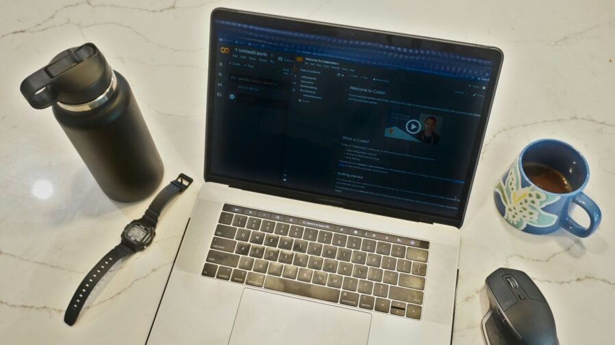 a laptop and coffee mug