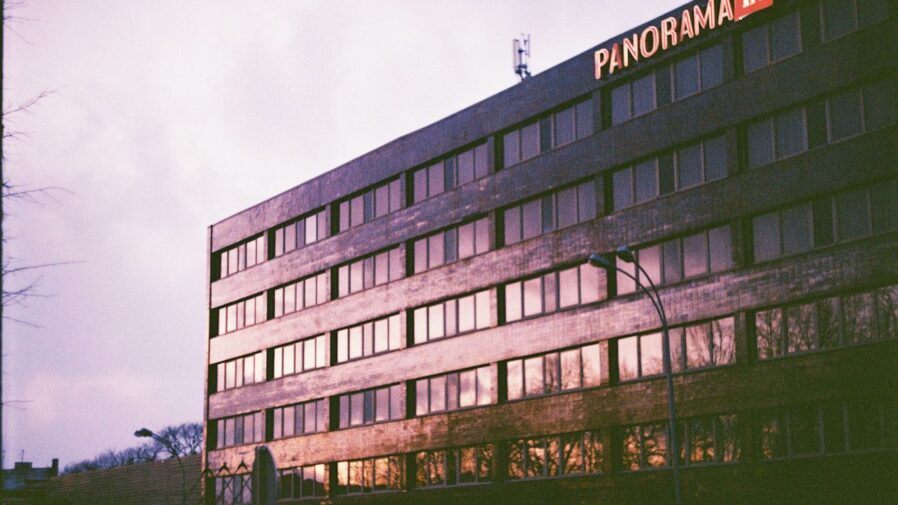 brown concrete building under white sky during daytime