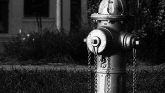 grayscale photo of water pump