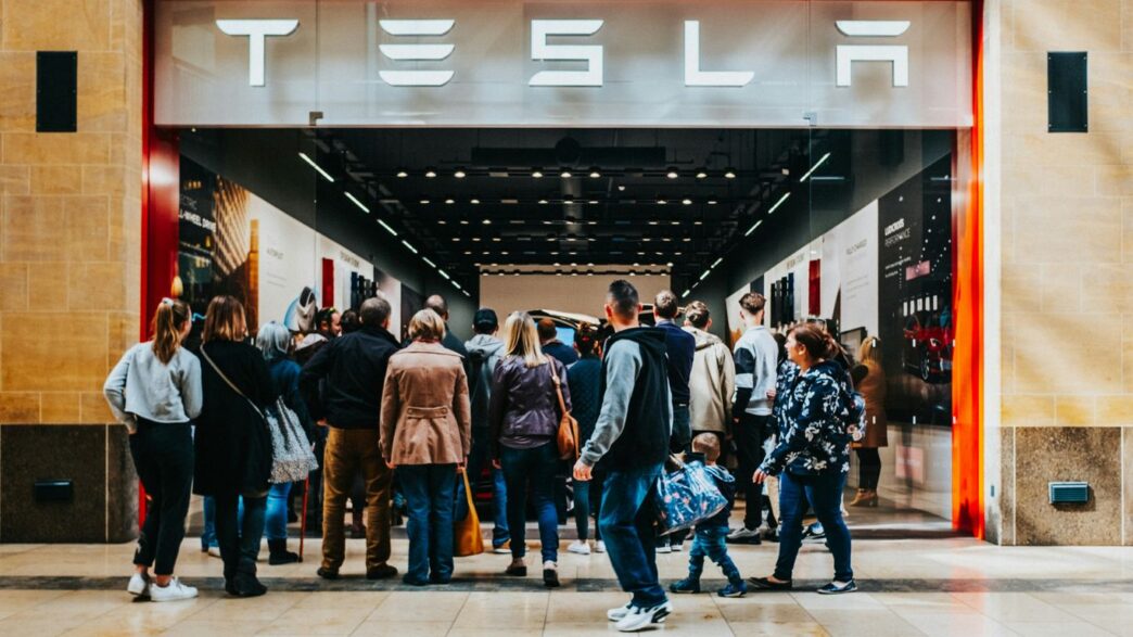 a group of people standing outside of a building