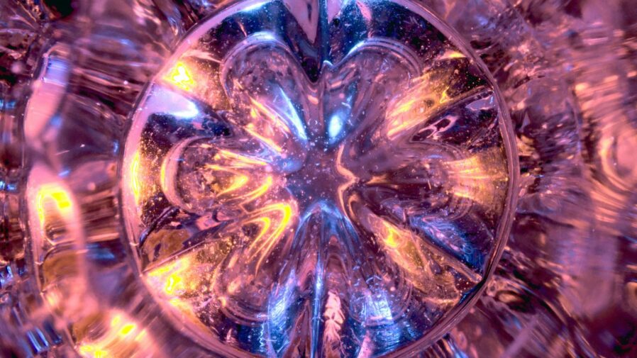 close up photo of clear glass star ornament
