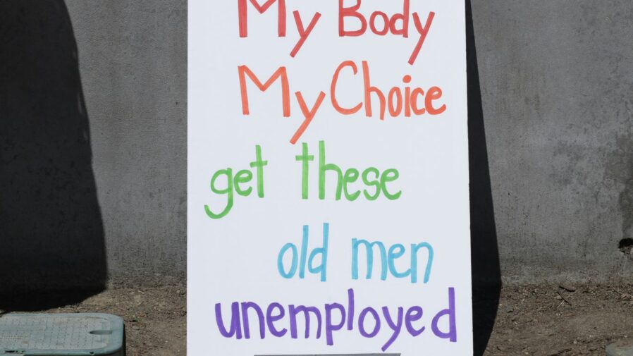 a sign in front of a door