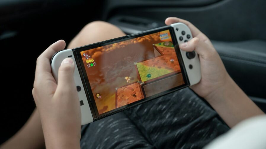 a person holding a [UNK] [UNK] game [UNK]