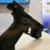 a close up of a gun on a table