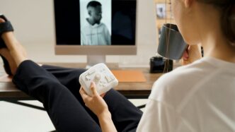 Woman takes a break during a video call.