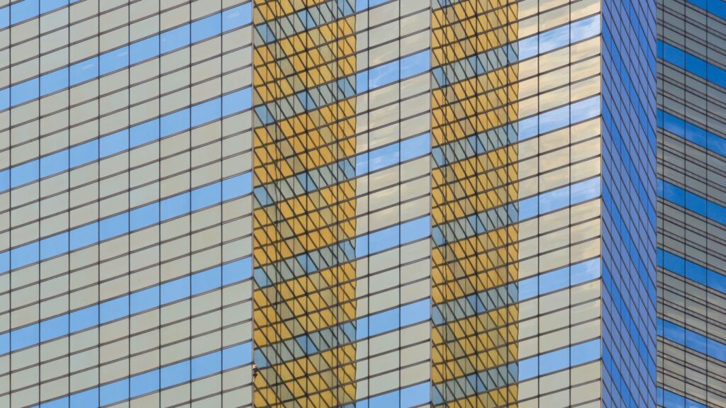 A tall building with a clock on it's side