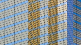 A tall building with a clock on it's side