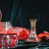clear glass pitcher on table