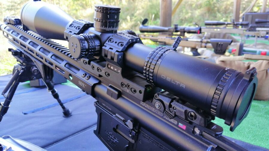 black rifle on blue table
