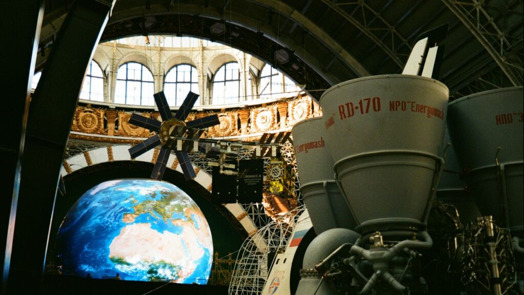 a space shuttle is parked in a large building