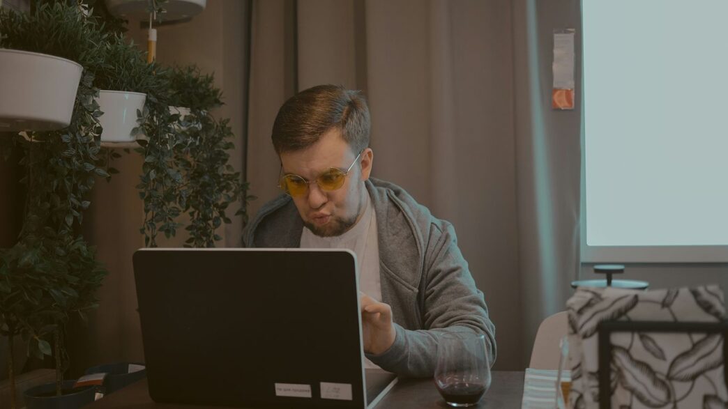 man working on laptop