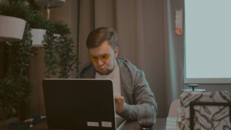 man working on laptop