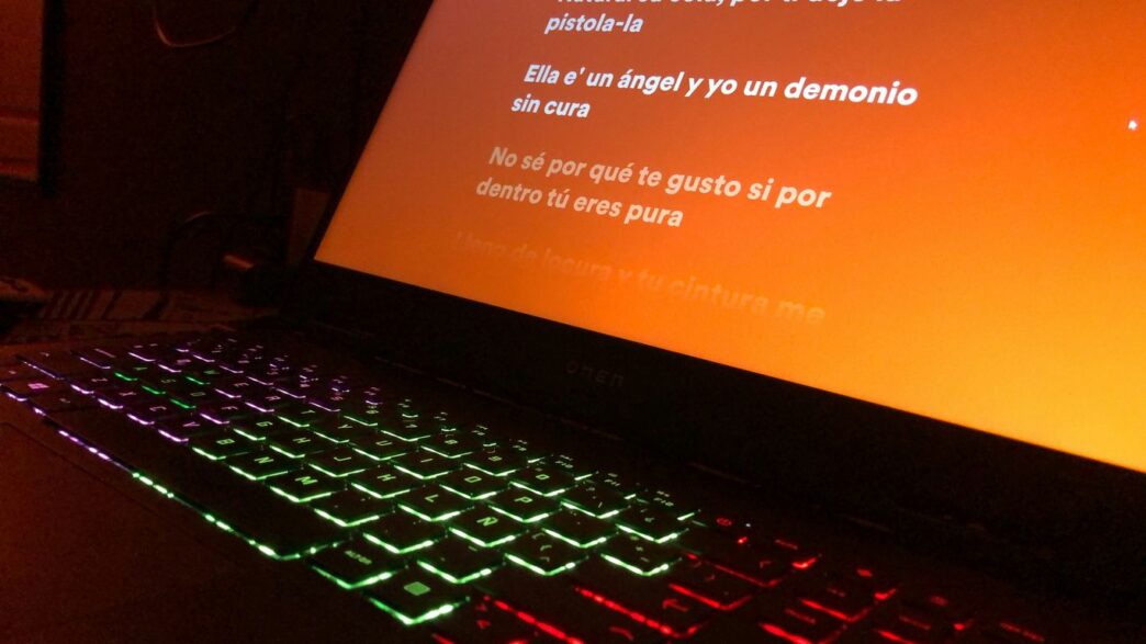 A laptop computer sitting on top of a desk