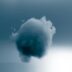 a large cloud is floating in the sky