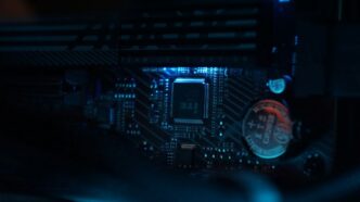 A close up of a computer motherboard in a dark room