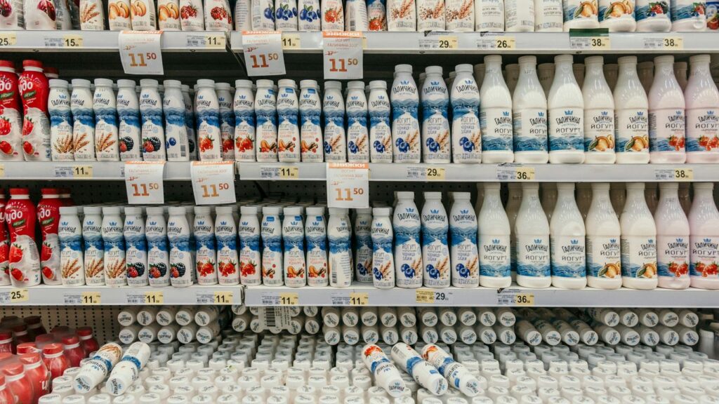 white and blue labeled bottles