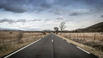 empty road between open field