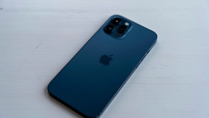 blue iphone case on white table