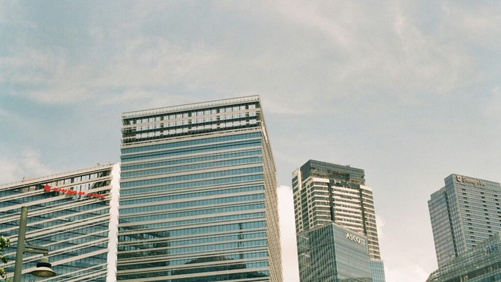 white and blue high rise building
