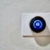 white thermostat at 62