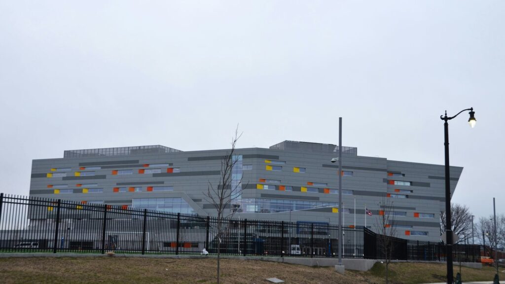 a large building with a lot of windows on the side of it