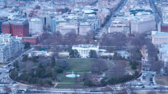 an aerial view of a city with lots of buildings