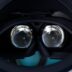 a close up of a person holding a pair of glasses