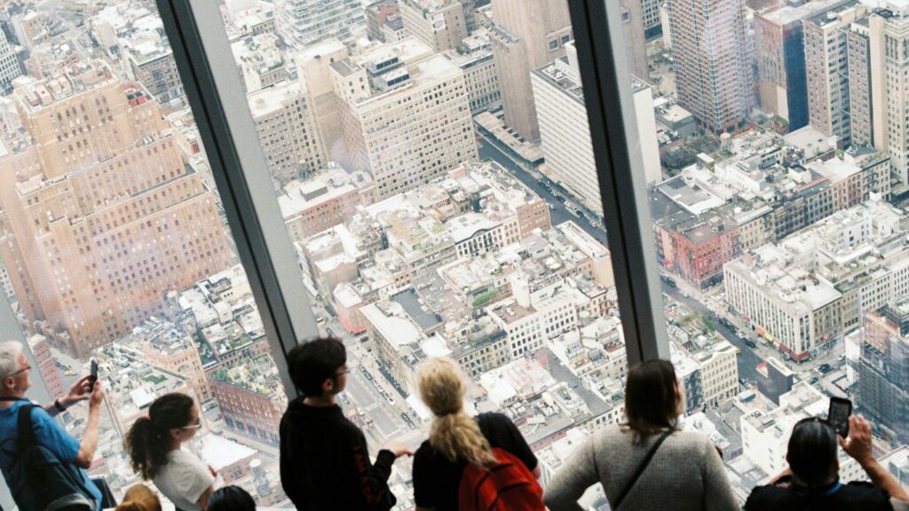 people over looking at building