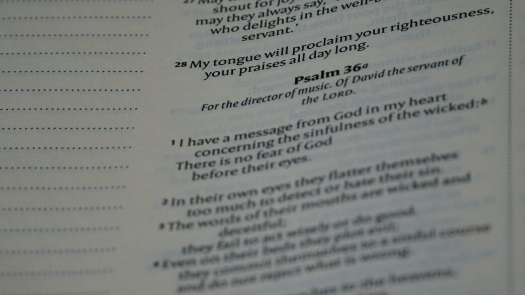a close up of a book with a poem on it