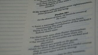 a close up of a book with a poem on it