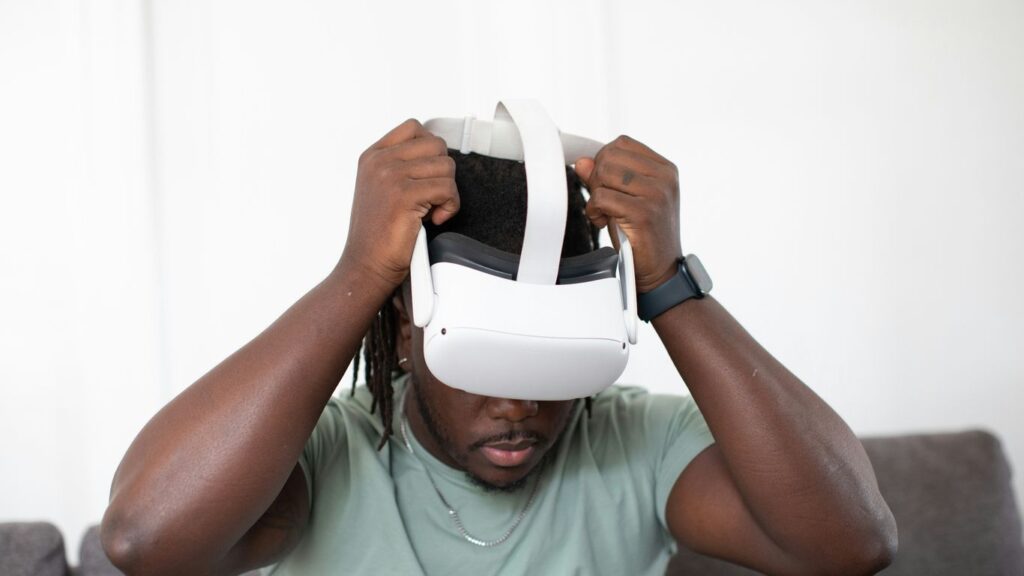 a person holding a white bucket over the head