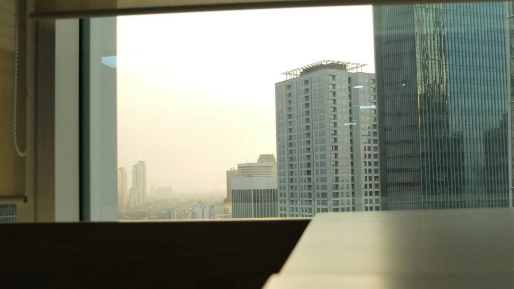 a view of a city through a window