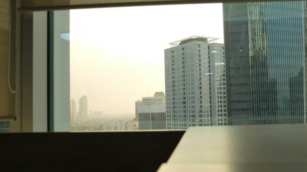 a view of a city through a window