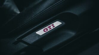 a close up of a suitcase with a tag on it