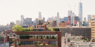 A new york city skyline view on a sunny day.