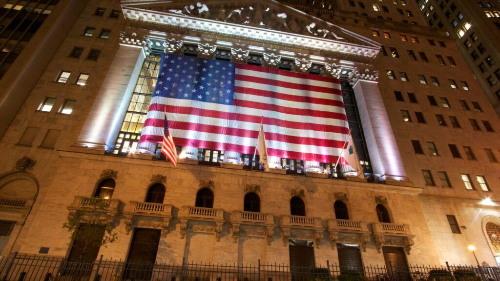 a large flag from the ceiling of a building