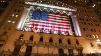a large flag from the ceiling of a building