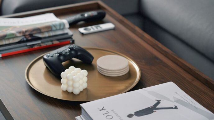 a coffee table with a game controller on it