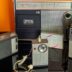 a bunch of old radio's sitting on a table
