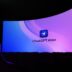 Large screen displaying "chatgpt atlas" logo