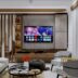 A living room filled with furniture and a flat screen TV
