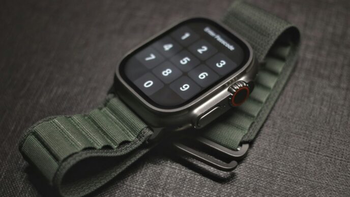 an apple watch with a green strap