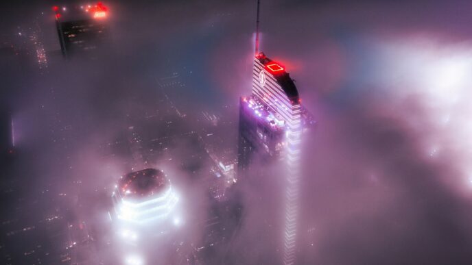 an aerial view of a city in the fog